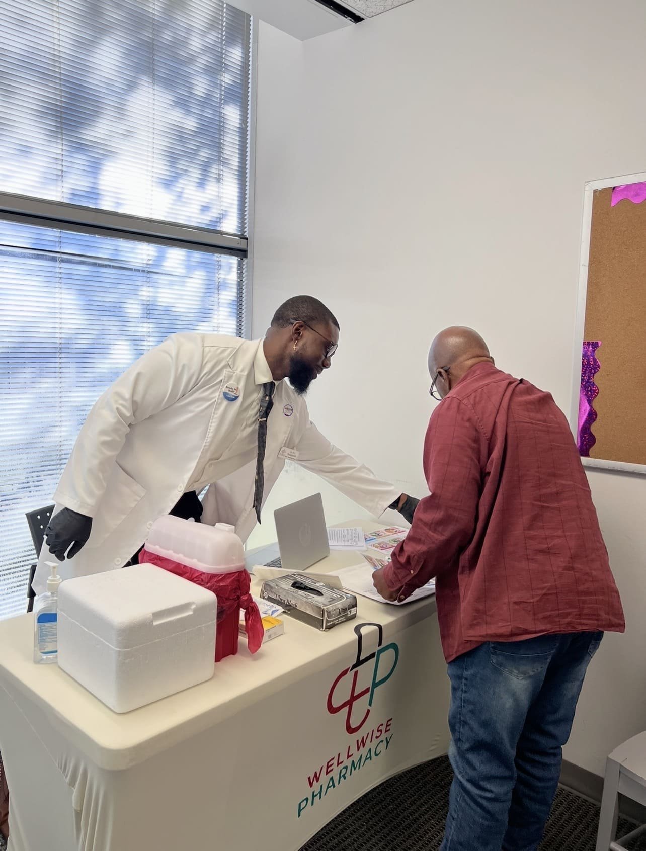 Compassionate pharmacy professionals assisting patients and explaining medication options